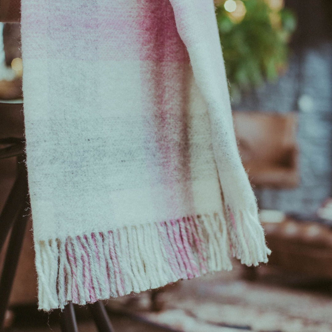 Pink and grey check throw online